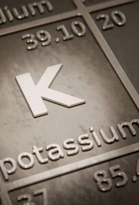 Highlight on chemical element Potassium in periodic table of elements. 3D rendering